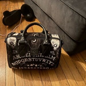 Mystifying Oracle Black Crossbody Bag